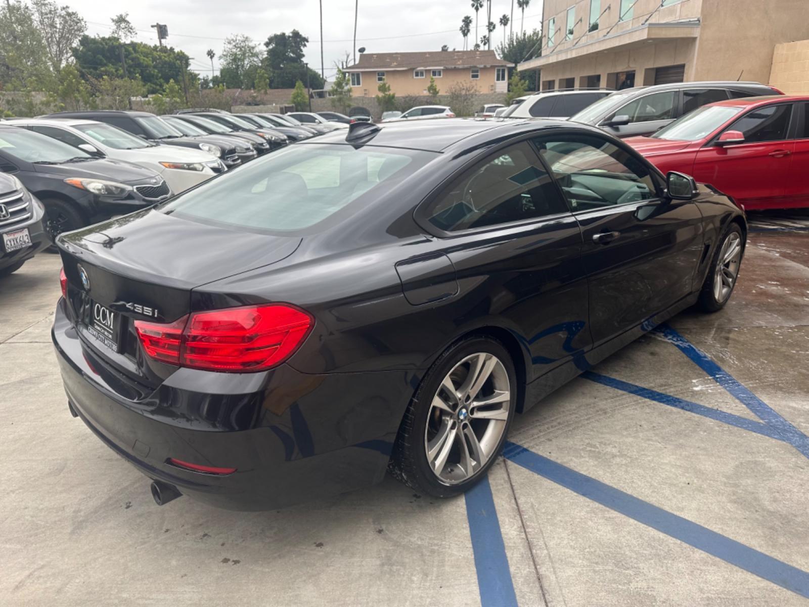 2015 Black BMW 4-Series 435i coupe (WBA3R1C55FK) with an 3.0L V6 DOHC 24V engine, 8-Speed Automatic transmission, located at 30 S. Berkeley Avenue, Pasadena, CA, 91107, (626) 248-7567, 34.145447, -118.109398 - Photo #4